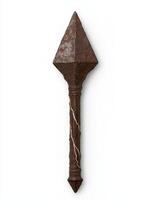 Rusted iron spearhead against white background photo