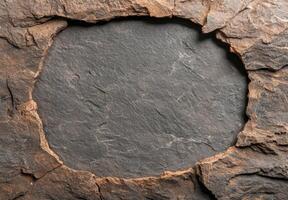 Textured rock surface with natural crevice photo