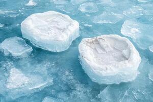 Icy frozen lake with floating ice blocks photo