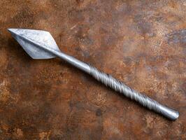 Rusted metal surface with a twisted steel drill bit photo