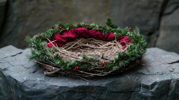 Festive Christmas wreath with red roses and pine branches photo