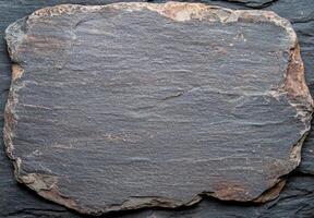 Rugged slate rock surface texture photo