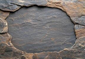 Rugged rock texture background with natural patterns photo