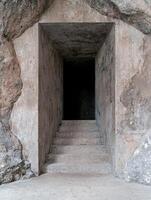 Mysterious stone staircase leading into the unknown photo