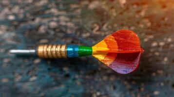 Colorful dart arrow on abstract background photo