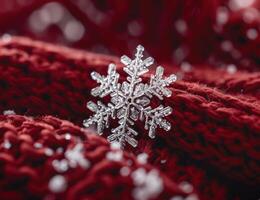 Sparkling snowflake on red fabric photo