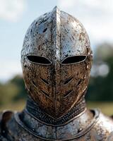 Armored knight helmet with intricate design photo