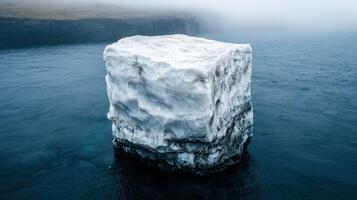 Majestic Iceberg Floating in Serene Ocean photo