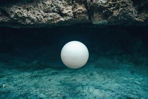 An egg floating in the ocean photo