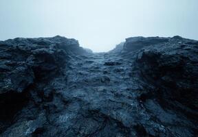 Dramatic rocky coastline with crashing waves photo