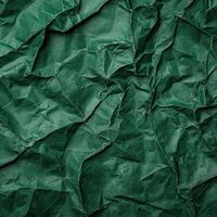 crumpled green paper texture background photo