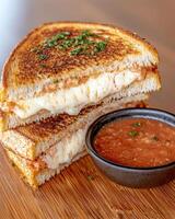 Grilled cheese sandwich with tomato soup photo