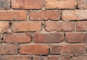 Weathered brick wall texture background photo