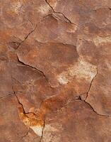 Cracked rock surface texture background photo