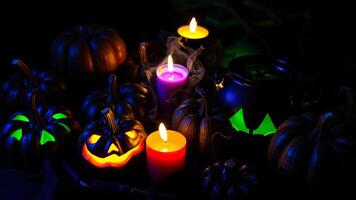 smiling pumpkins illuminate a dark halloween scene photo
