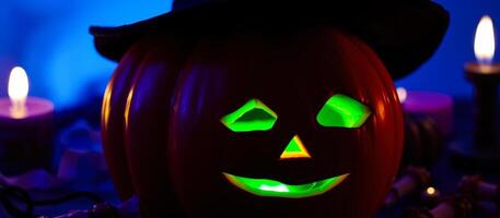 carved pumpkin glows with a green face a festive setting photo