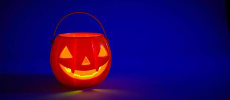 luminous pumpkin set against a blue background photo