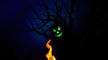 glowing jack-o'-lantern face peeks out from behind a shadowy tree photo