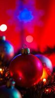 red christmas ornament hanging on a tree photo