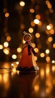 festivo figurilla un mujer rodeado por calentar luces foto