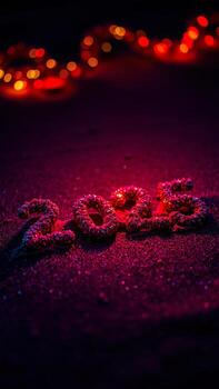 number 2023 formed from sparkling objects on a dark glittering surface with blurred circular lights the background. photo