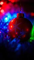 red ornament with a snowflake design on a festive backdrop photo