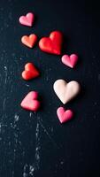 collection heart-shaped objects on a blue surface photo
