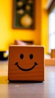 wooden block with a smiling face photo