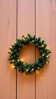 festive evergreen wreath with warm white lights photo