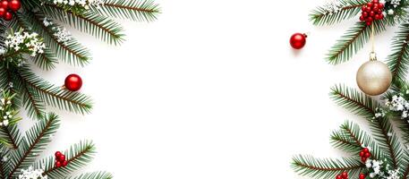 festive evergreen branches with red ornaments a gold bauble create a border against white photo