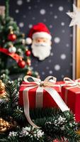 red gift box under a christmas tree photo