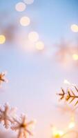 white gold snowflake decorations on a blurred light blue background photo