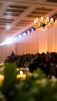 candlelit foliage blurs a festive gathering photo