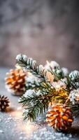 snowy pine branch with warm string lights photo
