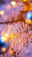 silver snowflake ornament glistens on a white christmas tree photo