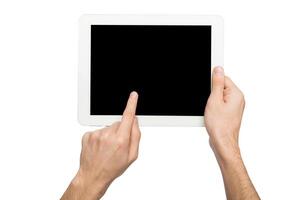 Closeup of man touching digital tablet display, cutout. Male hand holding digital tablet and pointing with index finger on blank screen, white isolated background, copy space photo
