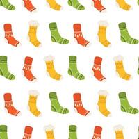 Seamless pattern with Christmas socks. Colorful background. vector