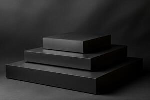 Minimalist podium mockups with black rectangular platforms on a dark background and soft lighting in a studio photo