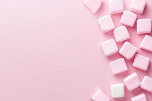 A playful pink marshmallow arrow pointing upward on a soft pastel background for creative projects photo