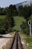 Rails and a railway in the Alps. photo