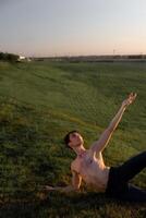 Summer activity and energy. Ballet dancer. Handsome man workout and stretching. photo
