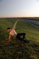 Summer activity and energy. Ballet dancer. Handsome man workout and stretching. photo