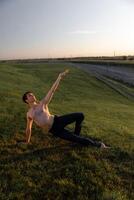 Summer activity and energy. Ballet dancer. Handsome man workout and stretching. photo