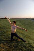 Summer activity and energy. Ballet dancer. Handsome man workout and stretching. photo