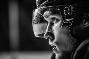 profile portrait of a hockey player during a game photo