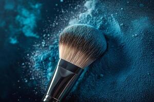 blush texture sample and makeup brush on dark background photo