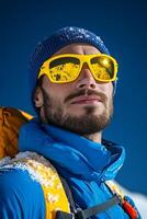 Athlete in jacket and sunglasses in mountains photo