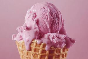 Pink ice cream in a waffle cone photo