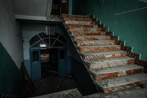 Inside old Orlovka Asylum for the insane in Voronezh Region. Dark creepy abandoned mental hospital photo