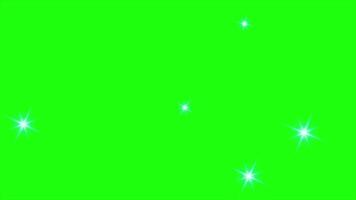 Glowing stars sparkle. Bokeh lights effect background. Sparkle particles shine animation effect. Glitter sparkle animated green screen video
